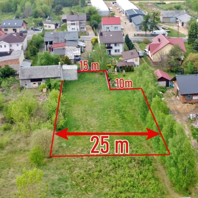 Aerial view of a red-outlined vacant lot with a 25 m base and stepped 15 m and 10 m segments in a suburban neighborhood.