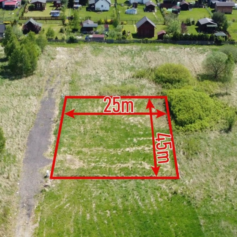 Aerial view of a rectangular vacant plot outlined in red with dimensions 25 m by 45 m.
