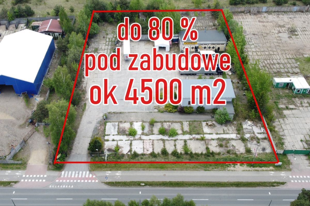 108226385.jpg Aerial view of a vacant lot outlined in red for development with Polish sale text about up to 80% and ~4500 m2.