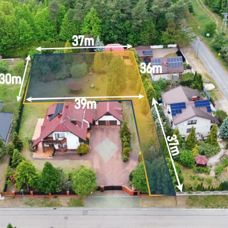 Aerial view of a house with a yellow boundary outlining the lot and dimension labels: 39 m along the front, 37 m along the rear, 30 m on the left side, and 36 m and 37 m on the right edge; visible yard, driveway, and neighboring homes.