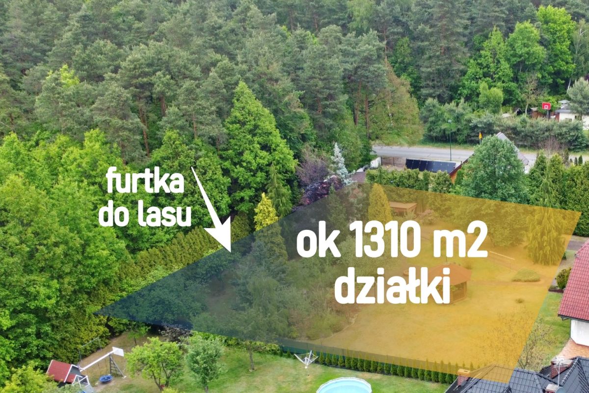 Drone view of a green, tree-filled property with a highlighted plot labeled 'ok 1310 m2 działki' and 'furtka do lasu' indicating forest access (for sale).