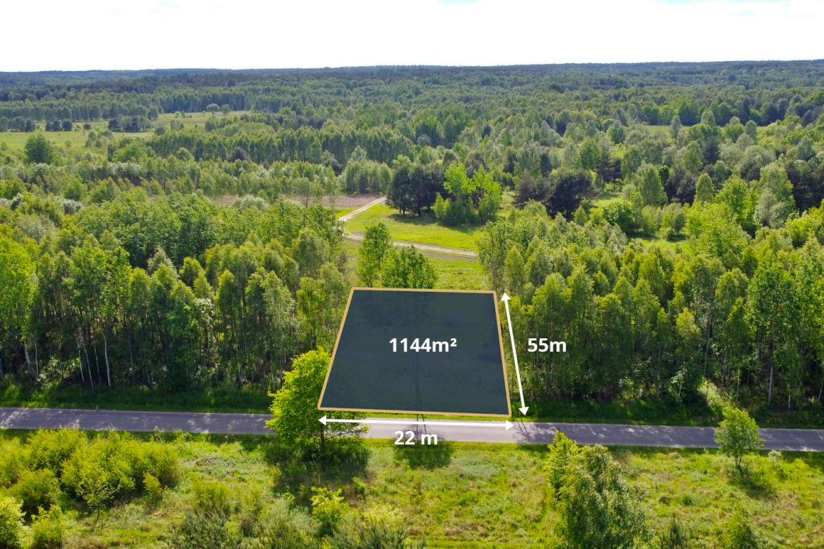 Aerial view of a 1,144 m² vacant plot outlined in yellow, measuring 22 m by 55 m along a road with surrounding trees.