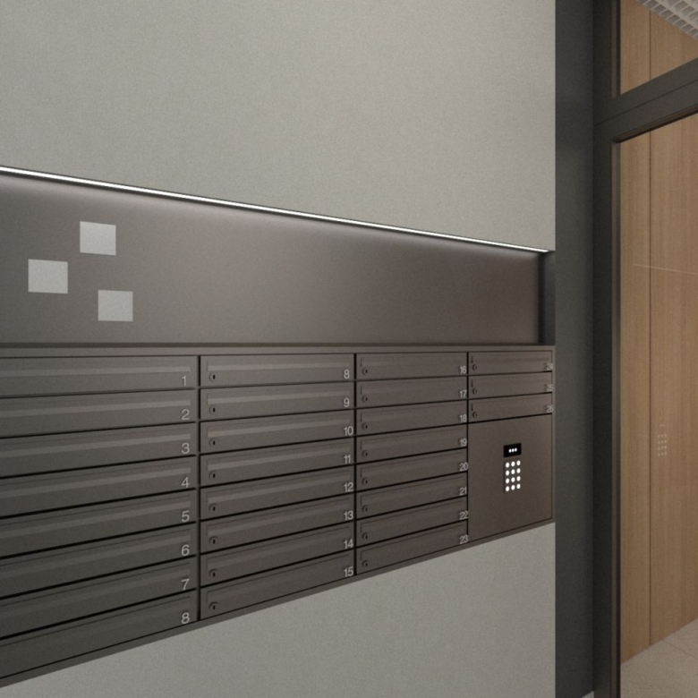 Row of grey apartment mailboxes with numbered slots and a small keypad panel on the right in a corridor near a glass door.