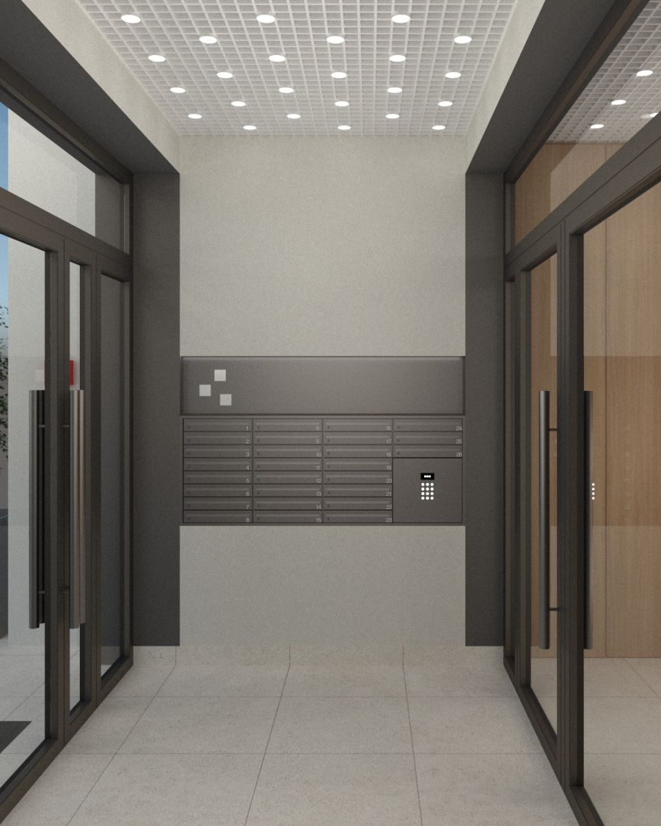 Dark gray wall with row of metal mailboxes and a keypad for access control in a modern lobby.
