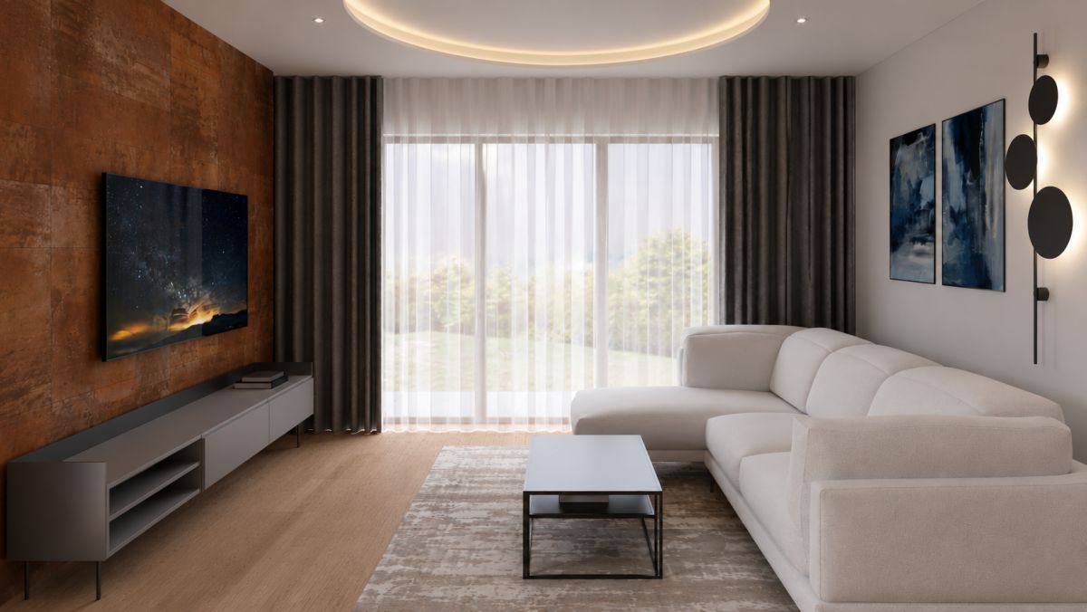 Living room with rust accent wall, wall-mounted TV, gray media console, and a white sectional sofa.