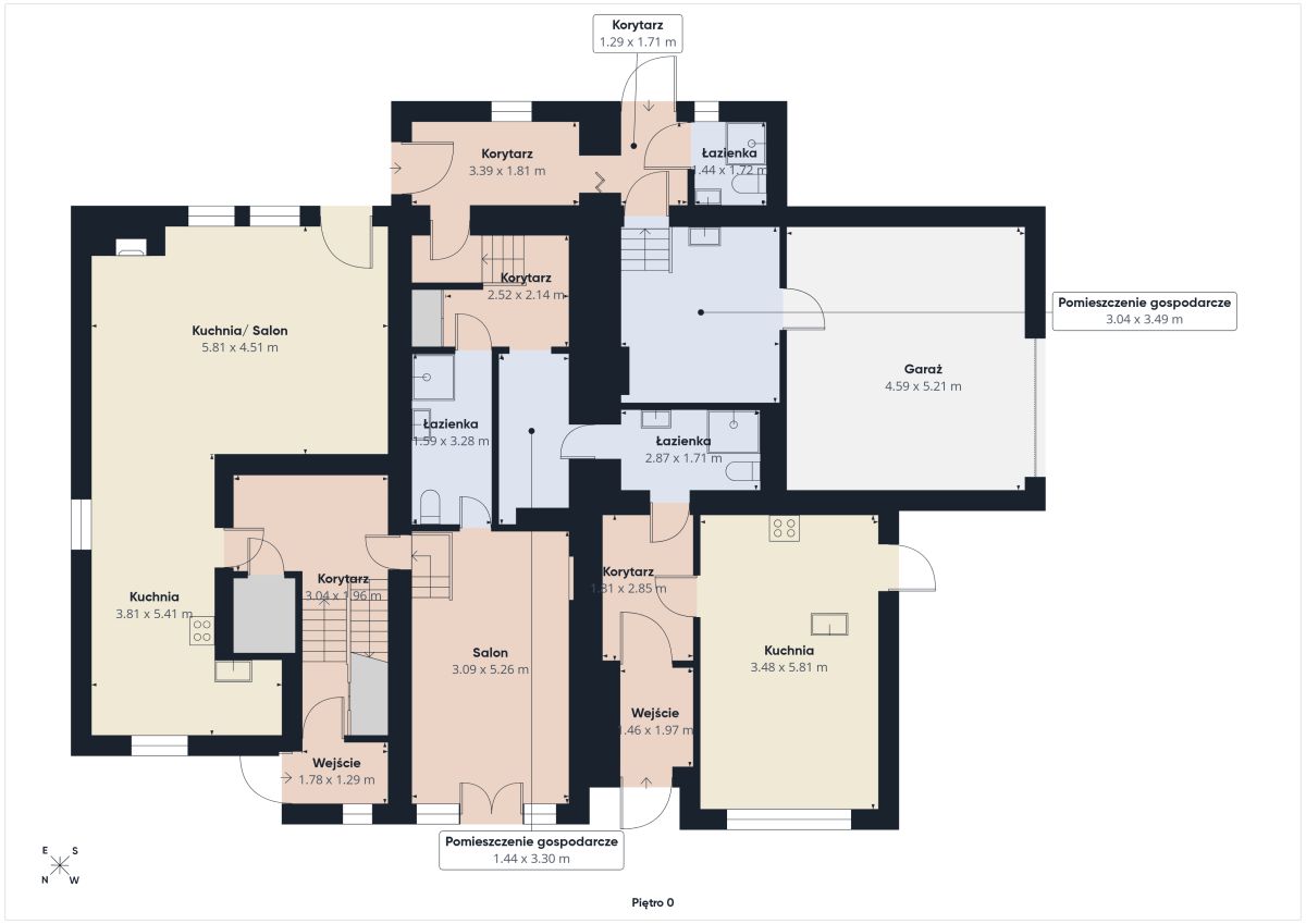 Ground-floor floor plan of a multi-room house with kitchens, living areas, bathrooms, corridors, and a garage with access doors and stairs.