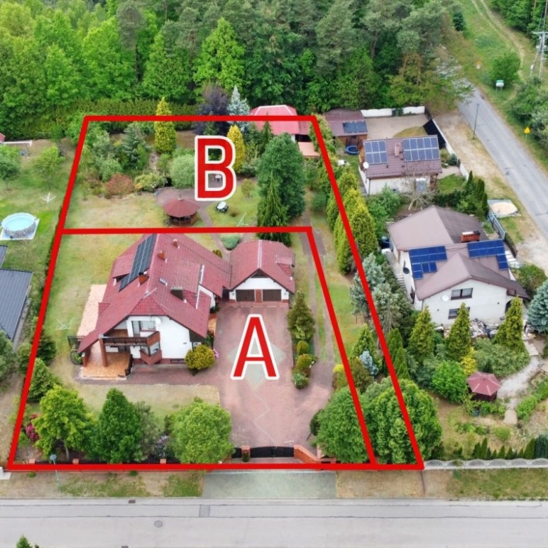 Aerial view of a house with two red-outlined areas labeled A (front) and B (rear) surrounded by trees and lawn.