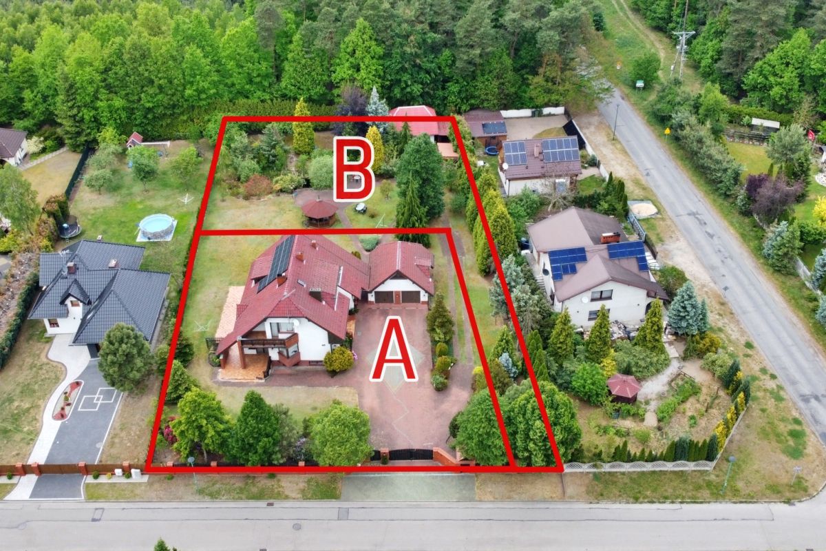 Aerial view of a house with two red-outlined areas labeled A (front) and B (rear) surrounded by trees and lawn.